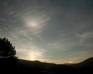 IMG_7392 Before sunrise, there is a sundog on the right and high in the sky, a sun pillar rising from the mountain.