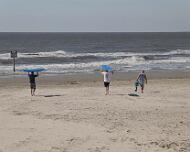 IMG_1650 Headed to the beach for instructions. James P is in white shirt, James T is in black shirt.
